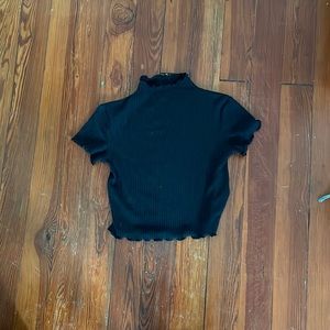 Black t shirt w a small turtle neck